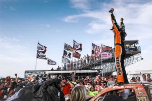 CJ Greaves celebrates on his way to a Pro-4 sweep in Bark River.