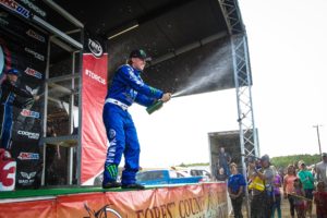 CJ Greaves celebrate his first Pro Stock UTV win at Crandon International Raceway.